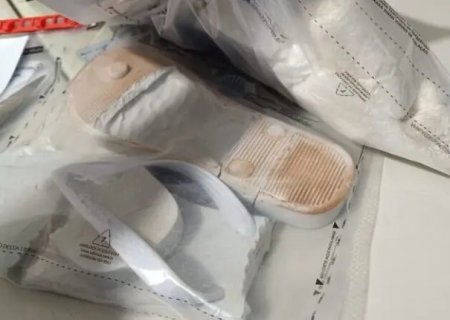 Visitante esconde cocaína no chinelo para entregar ao filho, detido na PED, e é presa